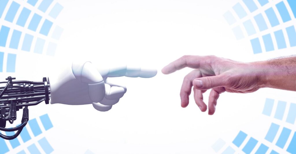 Una mano de un robot y una mano de un humano a punto de tocarse